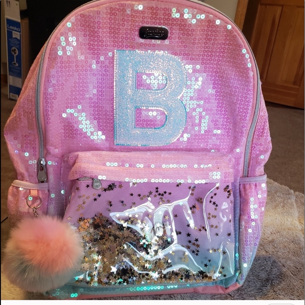 ISO: Glitter shaky backpack from justice. Letter B